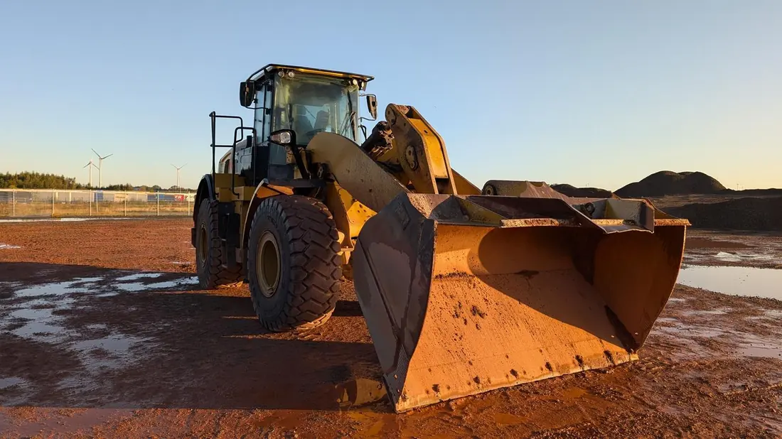Heavy equipment on a mineral development site, representing the on-the-ground work MineDada's partnerships support