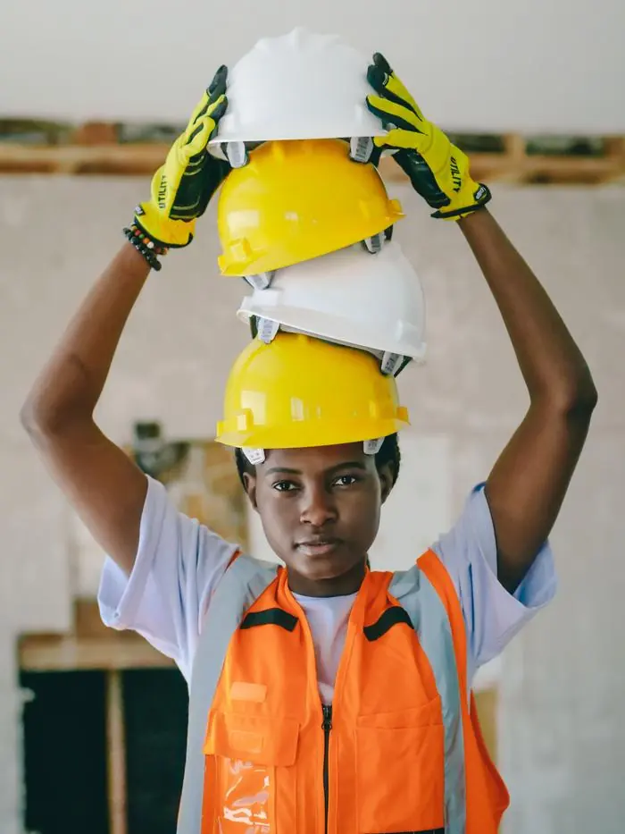 A young professional woman on site, representing the communities, women and young professionals MineDada aims to benefit