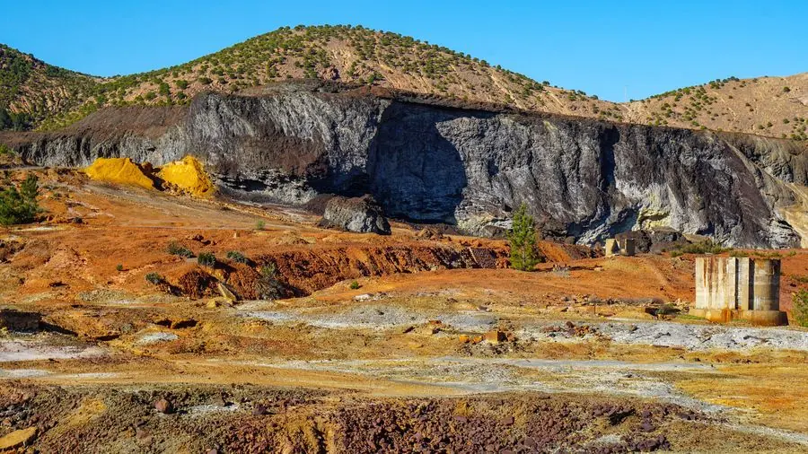 Mineral-rich terrain showing exposed rock and ore-bearing ground