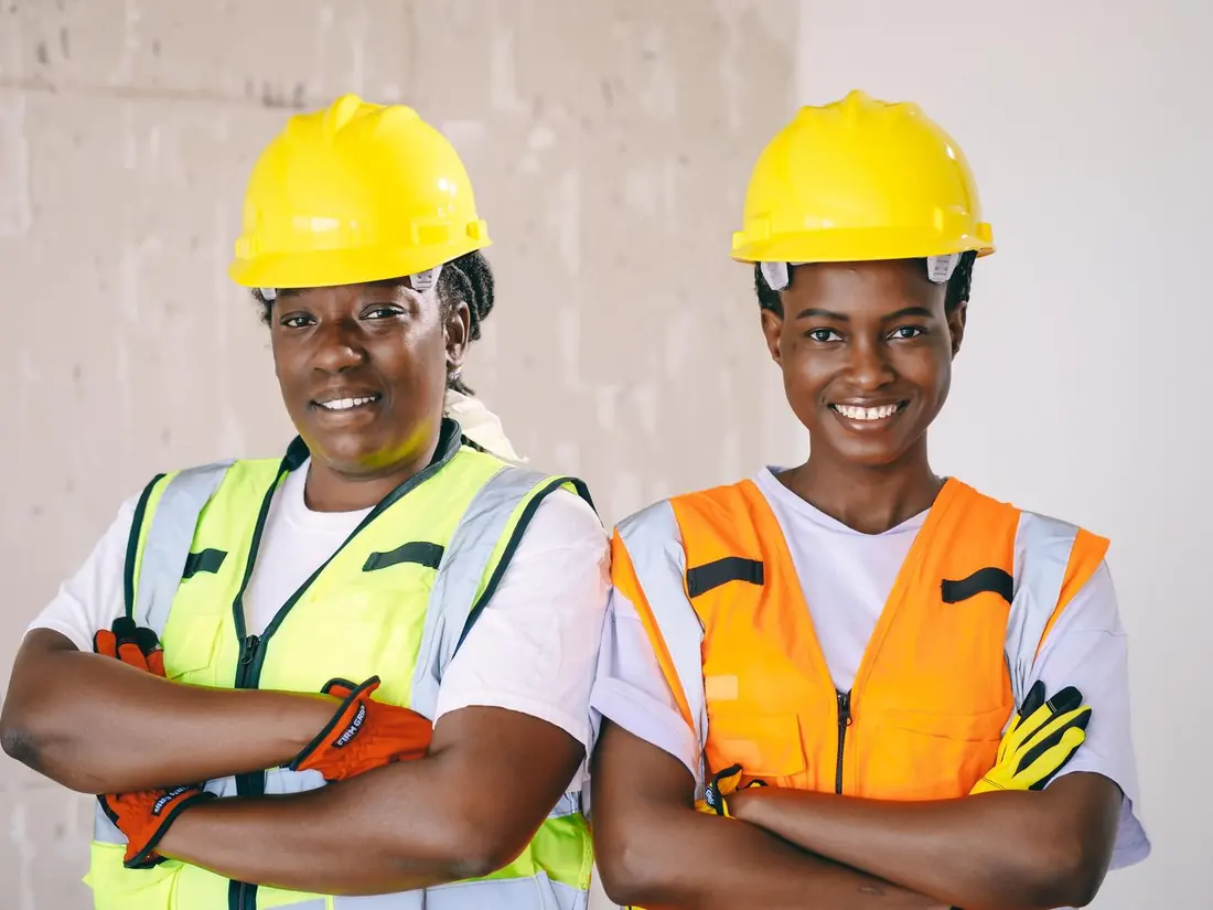 Professionals in safety gear at a MineDada-affiliated site, representing the people and partners who get involved with our work